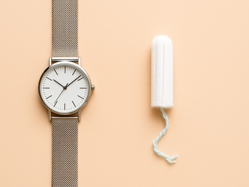 Visual of time passing while menstruation is delayed due to stress
